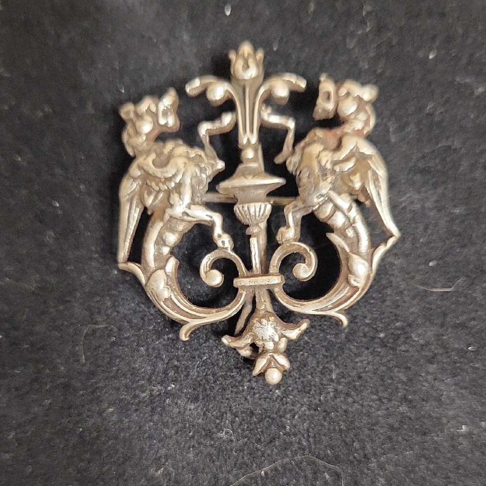 Antique Sterling Silver Fleur De Lis and Gargoyle  Brooch